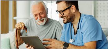 a doctor and patient looking at tablet.