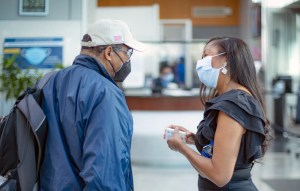 Man and woman having a discussion in a VA building 